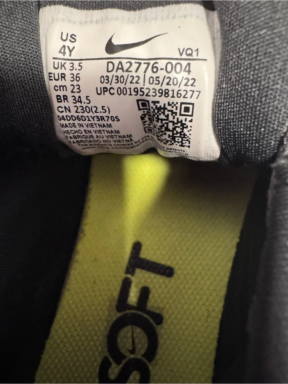 Nike Black Sneakers with Neon Yellow Swoosh and White Sole